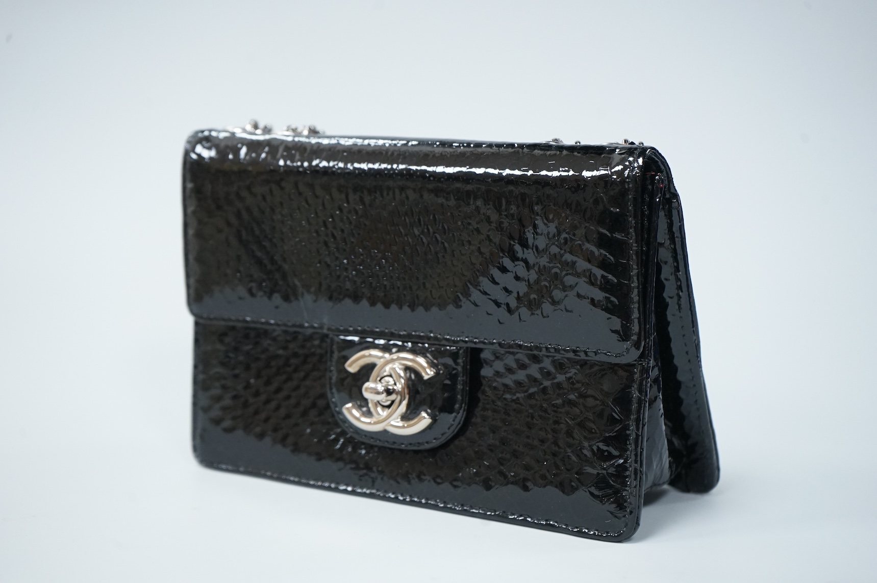 A Chanel patent black mini python handbag with silver hardware, date code 12008922, with dust bag, original paperwork, authenticity card and box, 17cm wide, Provenance: Purchased by the vendor Paris